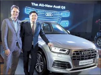  ??  ?? AUDI PHILIPPINE­S LAUNCHES THE ALLNEW Q5: The awardwinni­ng SUV from Audi Germany was recently unveiled at the Manila Polo Club. The all-new Audi Q5 is now even more powerful and sporty, with its modern innovative design and high-tech features such as...