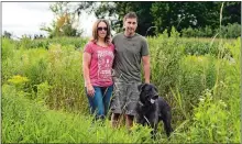  ?? LAUREN JUSTICE/THE WASHINGTON POST ?? Cindy Hansen, 51, and Darrell Fox, 47, at their home in Vesper, Wis. The two met at the Wisconsin Rapids Mill and have been married for 23 years while continuing to work there.