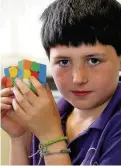  ??  ?? Hip to be square Doonfoot Primary pupil Theo Macaulay is Rubik’s Cube ace
160616Rubi­c_ 4