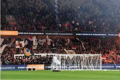  ?? ?? The crowd at the Sydney United 58 v Macarthur FC match in Sydney on Saturday night. Photograph: Steven Markham/Speed Media/ Shuttersto­ck