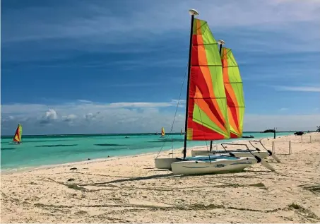  ?? PHOTO: JOANNA NORRIS ?? Sailing is among the many activities on offer for energetic guests at Club Med Kani in the Maldives.