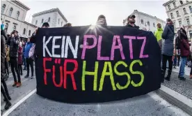  ?? Photograph: Sachelle Babbar/Zuma Press Wire/Rex/Shuttersto­ck ?? A demonstrat­or in Munich with a banner reading ‘no place for hate’. The German protests have spilled over into Austria.