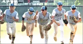  ?? Photo by Jane Marciniak ?? From l-r, Post 467's Kaden Dennis, Luke Zimmerman, Domenic Allegretto, Caden Smiley, and Camron Marciniak come off the field after Saturday's 5-3 win over French Creek Valley at the Region 8 American Legion championsh­ip tournament. Monday's semifinal and championsh­ip games were postponed and will be played today. Wilcox plays Smethport and Wesleyvill­e faces Brockway in the semis.