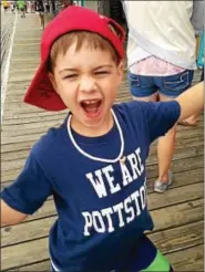  ??  ?? Ben Weidman, 7, shows his Pottstown Pride on the boardwalk in Ocean City, N.J.