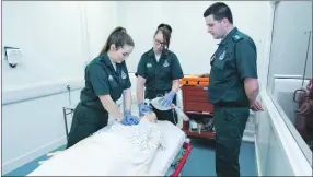  ??  ?? Public Health Minister Aileen Campbell announces a commitment to train 1,000 paramedics over five years on a visit to the Scottish Ambulance Service Training Academy.