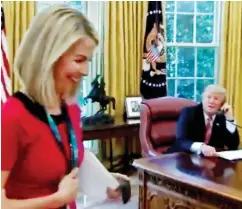  ??  ?? Flattered: She laughs as Mr Trump speaks to the Irish PM