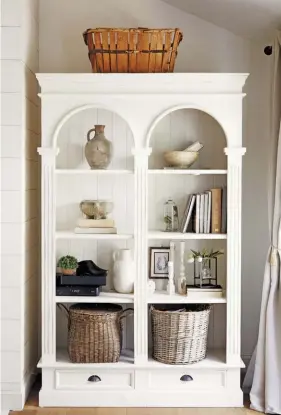  ??  ?? (top, right) Arches are a staple in Deb’s home and a signature of European farmhouse style. “The bookcase was the closest to getting the built-in look for a fraction of the price,” she says. “The arches made the piece look as if it was made for our house.”