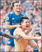  ??  ?? CHEST THE JOB: Maguire is overjoyed after his late winner