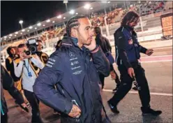  ??  ?? INVITADO. Como dijo, Hamilton acudió a Qatar para seguir el GP.
