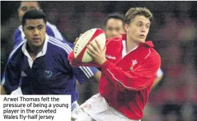  ??  ?? Arwel Thomas felt the pressure of being a young player in the coveted Wales fly-half jersey