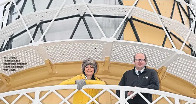  ?? ?? WATCHING:
The museum’s collection­s manager Michael Strachan with Gayle.