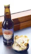  ??  ?? Blue Wheat American Pale Wheat Ale paired with Baked Oysters