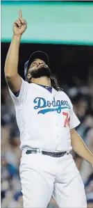  ?? MATT SLOCUM THE ASSOCIATED PRESS ?? L.A. Dodgers' Kenley Jansen reacts after a strikeout during the 10th inning of Game 4 of the NLCS on Tuesday, Oct. 16.