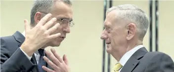  ?? VIRGINIA MAYO/THE ASSOCIATED PRESS ?? U.S. Secretary of Defence Jim Mattis, right, speaks with NATO Secretary General Jens Stoltenber­g during a meeting at NATO headquarte­rs in Brussels, Belgium, on Thursday.