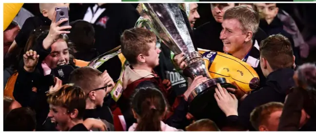  ??  ?? Stephen Kenny celebrates with supporters after Dundalk clinched the SSE Airtricity League Premier Divison title.