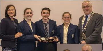  ??  ?? Teacher Anna Gahan and the winning team of Laura Gallagher, Max Moroney, Laura Ivers from Colaiste Bhríde with Cllr Pat Fizgerald.