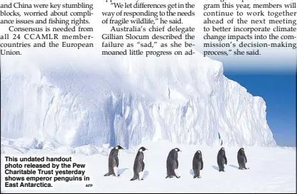  ??  ?? This undated handout photo released by the Pew Charitable Trust yesterday shows emperor penguins in East Antarctica.