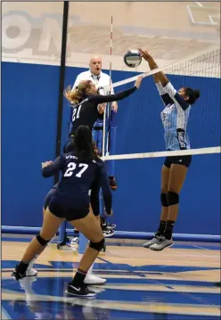  ?? Jessica Legaspi/ For The Signal ?? Saugus volleyball’s Amira Fann tips the ball in a match against West Ranch at Saugus on Wednesday.