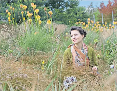  ??  ?? Sarah Price, who won a gold medal at Chelsea in 2012, with her gardens at the Olympic Park, Stratford. She has proved she is one of the best in her field