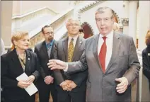  ?? Hans Pennink / Associated Press ?? State Sen. Neil Breslin, at right, speaks Tuesday at the Capitol. Listening are Assembly members Ellen Jaffee, D-suffern, Harry B. Bronson, D-rochester, and Phil Steck, D-colonie.