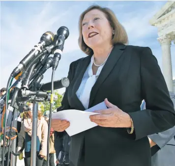  ?? CLIFF OWEN, AP ?? Kathleen Sullivan, an attorney for Samsung, answers questions outside the Supreme Court after oral arguments Oct. 11.