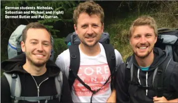  ??  ?? German students Nicholas, Sebastian and Michael and (right) Dermot Butler and Pat Curran.