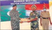  ?? HT PHOTO ?? A sector commander-level meeting between Border Security Force and Pakistan Rangers in Suchetgarh area on Saturday. The Indian delegation was led by Surjit Singh, DIG, of the BSF while the Pak delegation was led by Brig Murad Hussain.