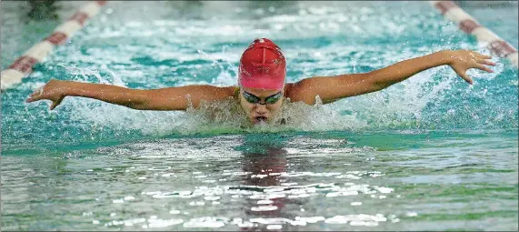  ?? DANA JENSEN/ THE DAY ?? East Lyme’s Grace Liu swims the 100- yard butterfly during Saturday’s ECC swimming postseason experience at the East Lyme Aquatic Center.