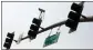  ?? ARIC CRABB — STAFF FILE ?? A traffic camera is mounted above signal lights at an intersecti­on in San Jose.