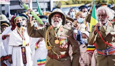  ?? Photo: AFP/Getty Images ?? War veterans celebrate the 80th Patriots’ Victory Day, commemorat­ing the end of the Italian occupation, at Meyazia 27 Square Addis Ababa, Ethiopia