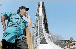  ?? CHARLIE RIEDEL/AP 2014 ?? Designer Jeffrey Henry looks over the Verruckt waterslide. Henry has been charged with second-degree murder.