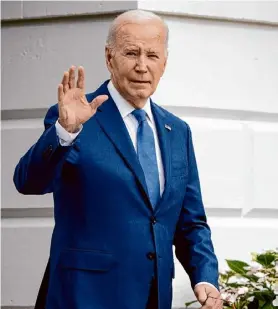  ?? Andrew Harnik/getty Images ?? President Joe Biden walks to Marine One in Washington on May 8. An assessment of public approval for major world leaders placed Biden at the top.