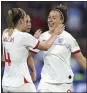  ?? FRANCISCO SECO — AP ?? England’s Lucy Bronze, right, celebrates with Keira Walsh after scoring her side’s third goal in Thursday’s victory.