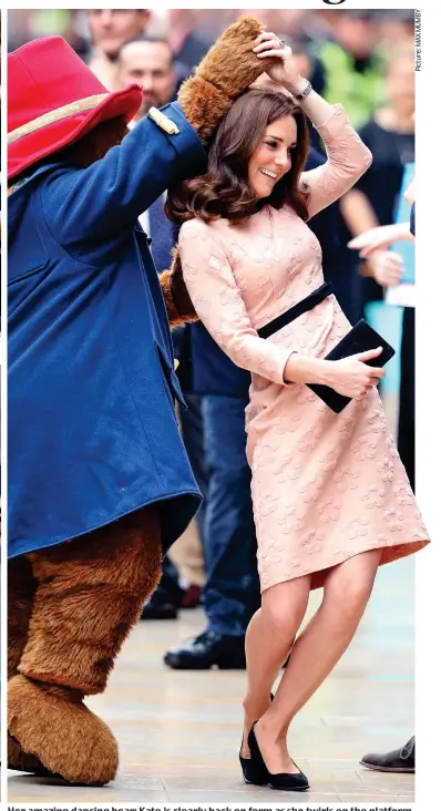  ??  ?? Her amazing dancing bear: Kate is clearly back on form as she twirls on the platform