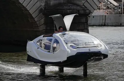  ?? Associated Press file photo ?? A Seabubble hydrofoil sails in Paris. The first hydrofoil was built 115 years ago, and the early 20th century witnessed one of the most profound technologi­cal revolution­s in human history. The early 21st century is proving similar, with energy in a defining role.