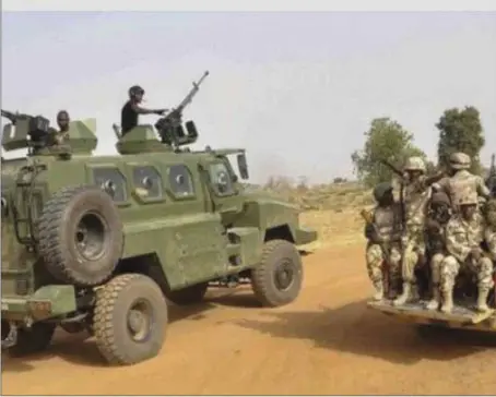  ??  ?? Nigerian Army special forces ready to combat Boko Haram.