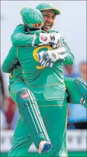  ??  ?? Pakistan captain Sarfraz Ahmed in a joyous mood following the dismissal of MS Dhoni.