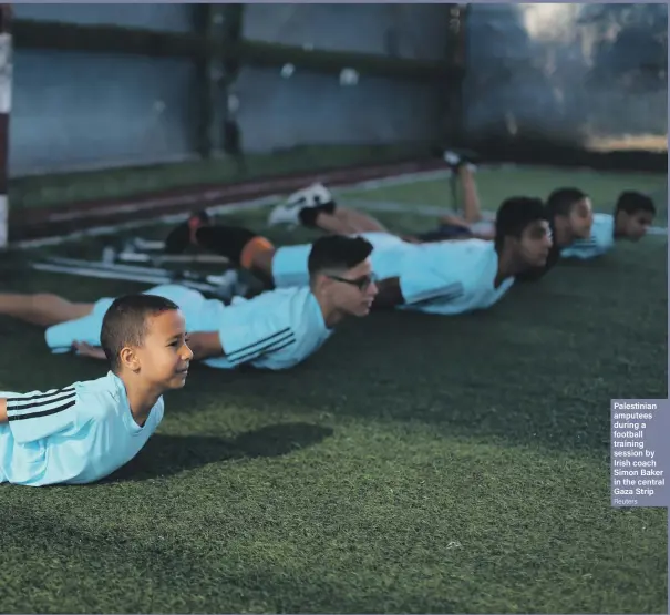  ?? Reuters ?? Palestinia­n amputees during a football training session by Irish coach Simon Baker in the central Gaza Strip