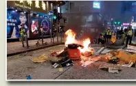  ?? Photo: GT ?? A group of black-clad protesters set a fire at Mong Kok in Hong Kong during an illegal protest in 2019, severely endangerin­g the public security.