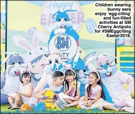  ??  ?? Children wearing bunny ears enjoy ‘egg-citing’ and fun-filled activities at SM Cherry Antipolo for #SMEggcitin­g Easter2018.