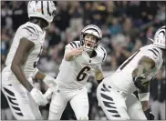  ?? PHELAN M. EBENHACK — THE ASSOCIATED PRESS ?? Cincinnati Bengals quarterbac­k Jake Browning (6) gestures during the first half Monday in Jacksonvil­le, Fla.