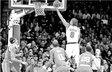  ??  ?? Michael Beasley #8 of the New York Knicks takes a shot in the fourth quarter against the Boston Celtics during their game at Madison Square Garden on December 21, 2017 in New York City. - AFP photo