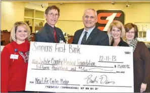  ??  ?? From the left are Foundation Specialist Natalie Horton; White County Medical Center President/CEO Ray Montgomery; Simmons First Bank President/CEO Brooks Davis; Simmons First Bank Vice President of Mortgage Lending Deana Powell; and Foundation...