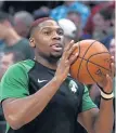  ?? CHRISTOPHE­R EVANS / BOSTON HERALD ?? WORTH THE EFFORT: Guerschon Yabusele, whose option was picked up by the Celtics, shoots during warmups before last night’s 117-113 victory against the Milwaukee Bucks at the Garden.