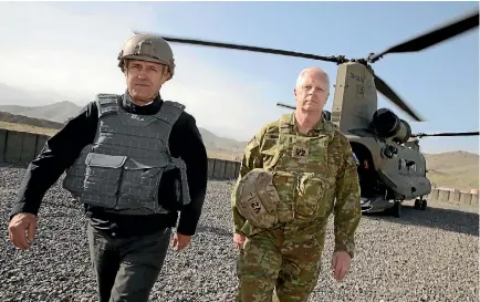  ?? PHOTOS: SUPPLIED ?? Australian Prime Minister Malcolm Turnbull and Chief of the Defence Force Air Marshall Mark Binskin arrive at Camp Qargha in Afghanista­n.