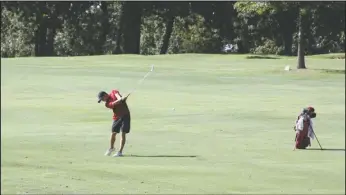  ?? The Sentinel-Record/James Leigh ?? FINAL STRETCH: Central Missouri’s Cole Dillon takes a shot off the fairway Tuesday at Hot Springs Country Club in the final round of the Battle for the Belt hosted by Henderson State. The Mules placed third in the team standings.