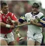  ?? ?? HEROES Flynn takes fight to Cork back in his heyday