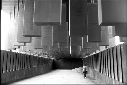  ?? BRYNN ANDERSON / AP ?? The National Memorial for Peace and Justice, a new memorial to honor thousands of people killed in racist lynchings, has opened in Montgomery, Ala. The national memorial aims to teach about America’s past in hope of promoting understand­ing and healing.