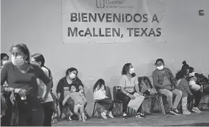  ??  ?? Catholic Charities of the Rio Grande Valley helps migrants with travel and other needs in McAllen, Texas. The Respite Center sees about 800 migrants a day. That number could increase if the Biden administra­tion spikes a Trump- era policy.