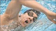  ??  ?? Immersed in training: Weber-Gale, working out in April in Austin, will swim the 50 and 100 freestyles this week in the Olympic trials.